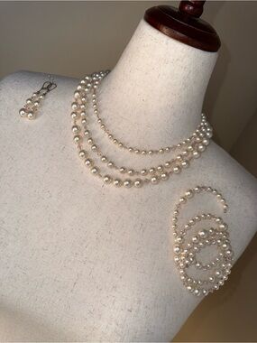 Classic Ivory Pearl Multi-Strand Necklace Set.